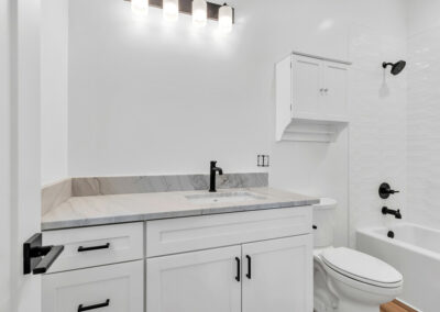 Snap ADU-Oceanside-Yucca-3 BR 2 BA-1200 sqft-Bathroom-White Cabinets-Black Fixtures