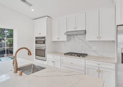 Snap-ADU-Rancho-Penasquitos-Palm-Beach-Ln-2-BR-2-BA-1200-sqft-Interior-White-Cabinets-Marble-Counters-Stainless-Steel-Range