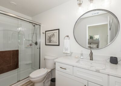 Snap ADU oceanside Cregar 2br2ba bathroom one piece shower round mirror 60 inch vanity