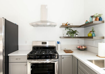 SnapAdu Vista Royal studio 67 gray kitchen chrome floating shelves stainless steel appliances